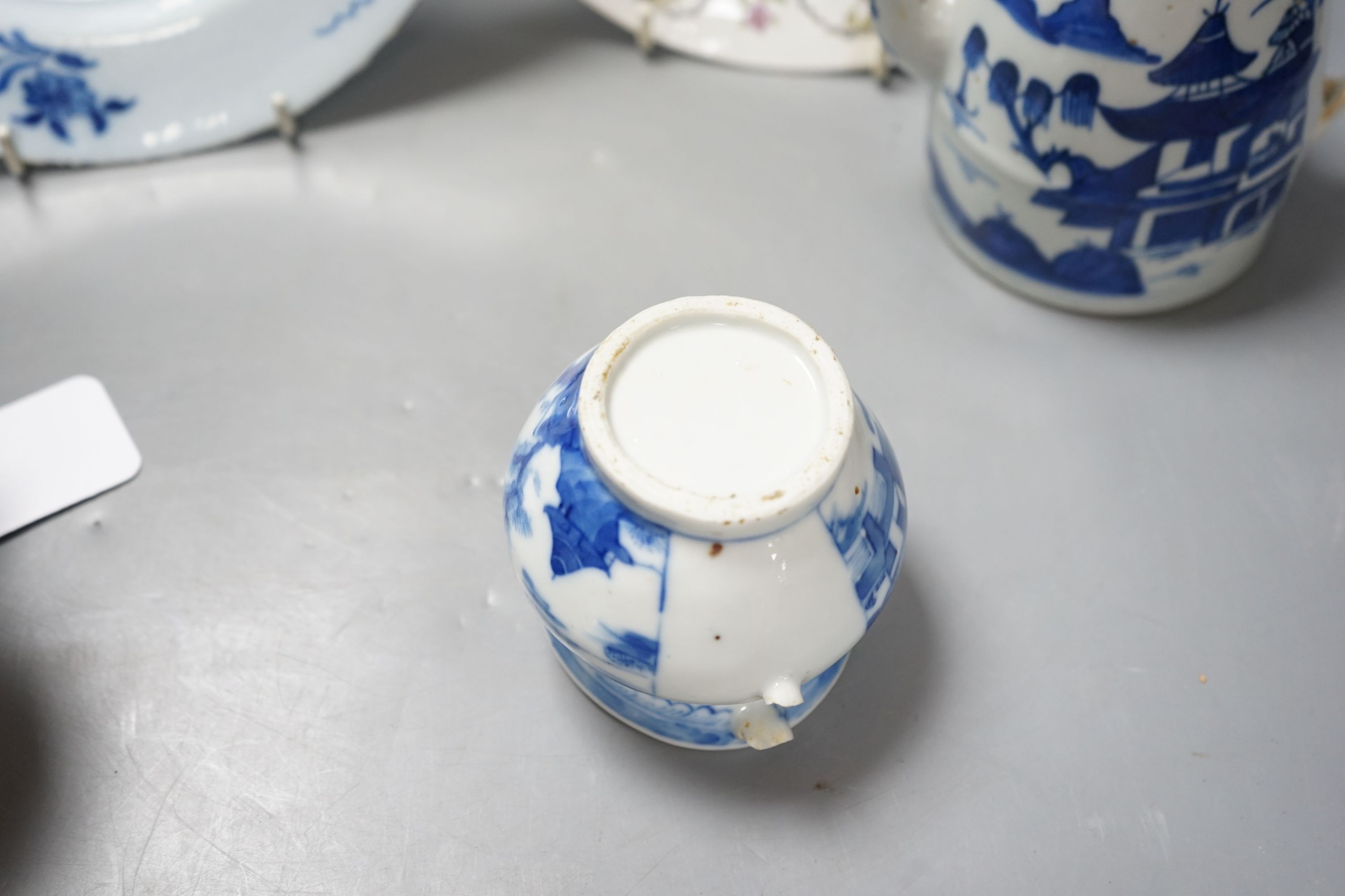 A Chinese blue and white bulb dish and a three piece teaset, a Delft plate and an English porcelain plate, 18th/19th century 23cm